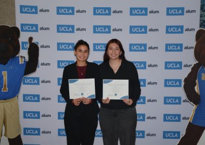 two scholarship winners pose together
