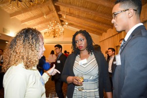 Ashly Henry discusses opportunities at Chevron with CEED students Sade Adeseun and Julian Patterson.